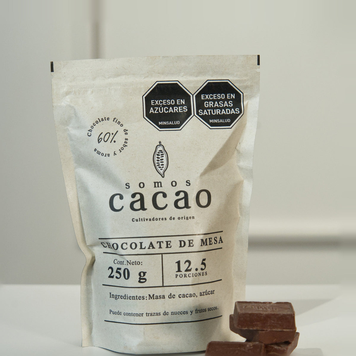 Chocolate de Mesa 60% Cacao · 250 g - bolsa y chocolate