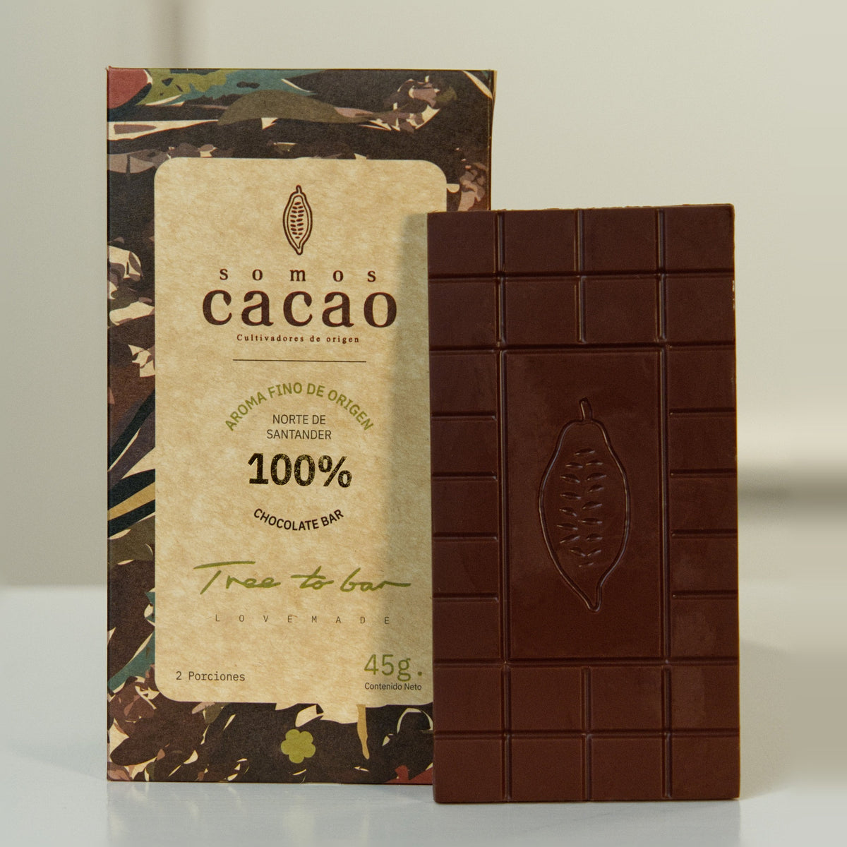 Tableta de Chocolate 100% Cacao · 45 g - empaque y tableta